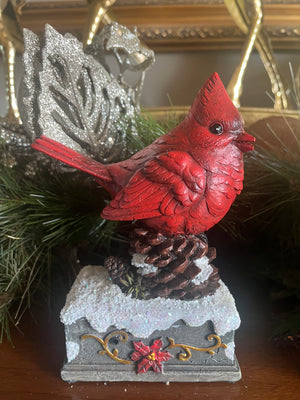 Cardinal on Festive Pedestal