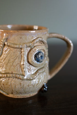 The Watchful Grimoire Pottery Mug