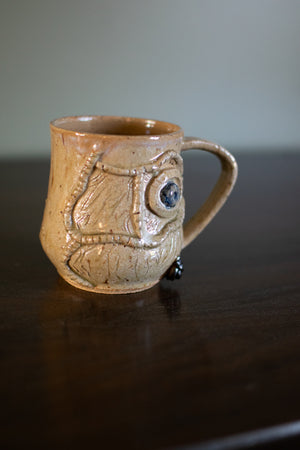The Watchful Grimoire Pottery Mug