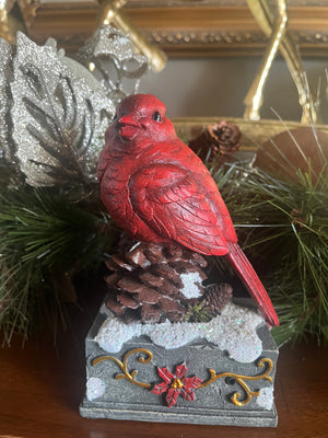 Cardinal on Festive Pedestal