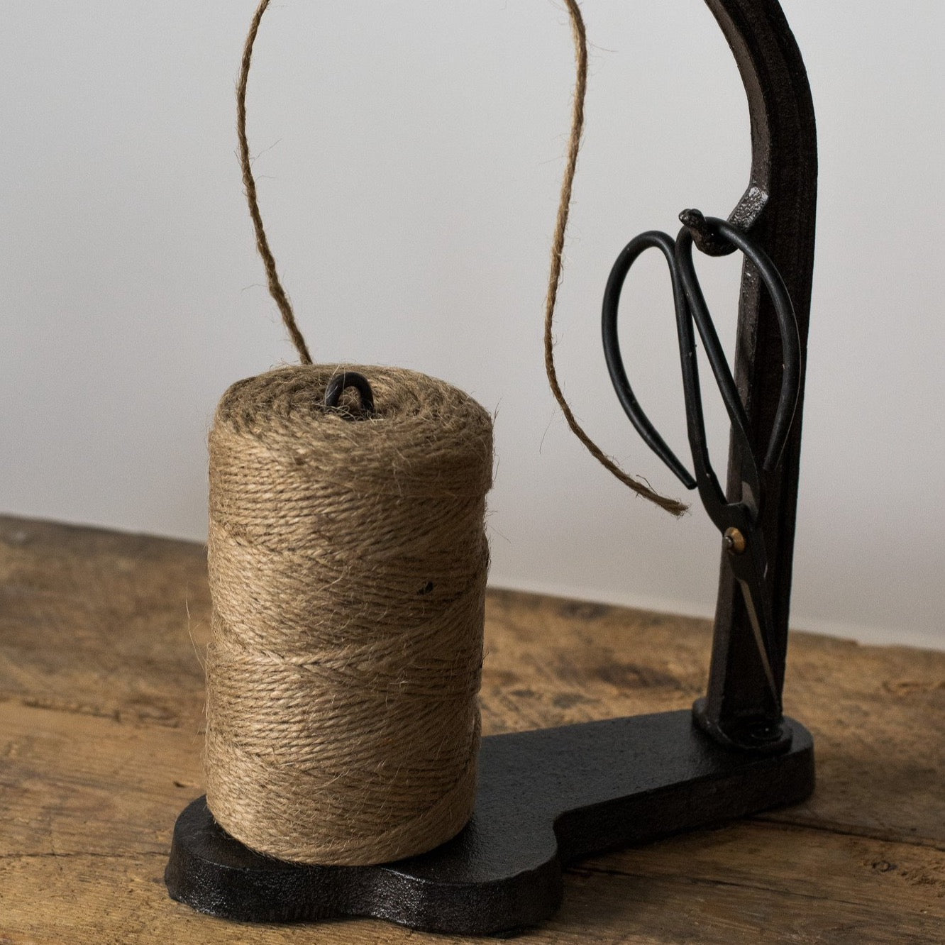 Cast iron string holder, jute rope dispenser